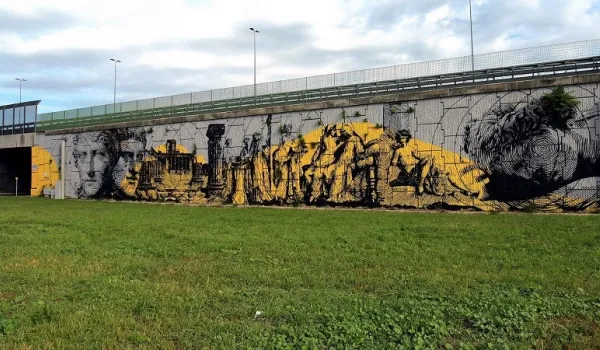 Muro con disegni street art