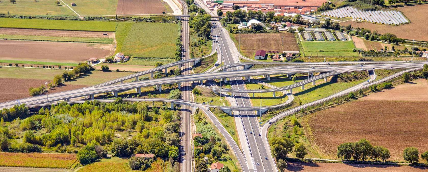 This is a picture of a road interchange taken from above (one road passes over the other). 